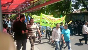 Tabriz, South Azerbaijan. Guds Day; Banner Reads; Down With the Communist Regime of China
